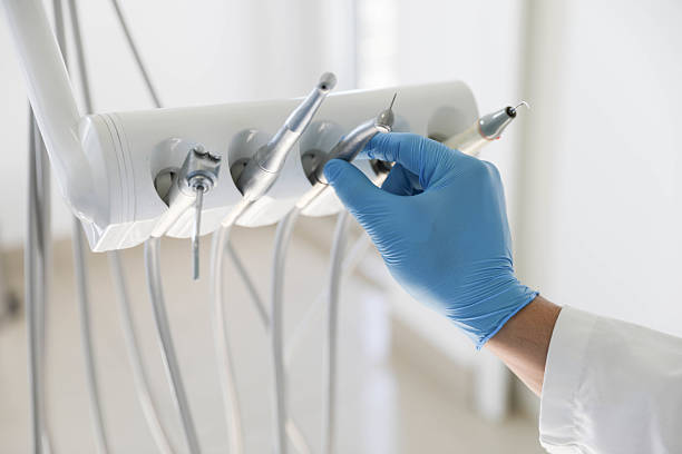 Professional Tooth Extraction technician working in Sheffield, IA